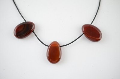 Carneol Trommelsteine flach gebohrt 5-er Set