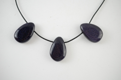 Blue goldstone tumbled stones flat drilled
