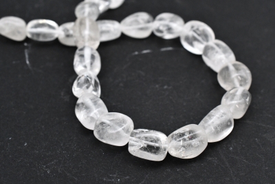 Bergkristall Trommelstein Strang