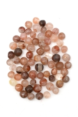 Clear quartz with hematite (hematoid) tumbled stones 