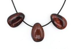 Tigerauge rot Trommelsteine flach gebohrt 5-er Set